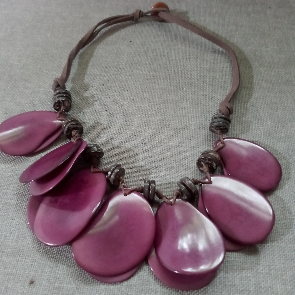 Oval purple choker on adjustable brown leather